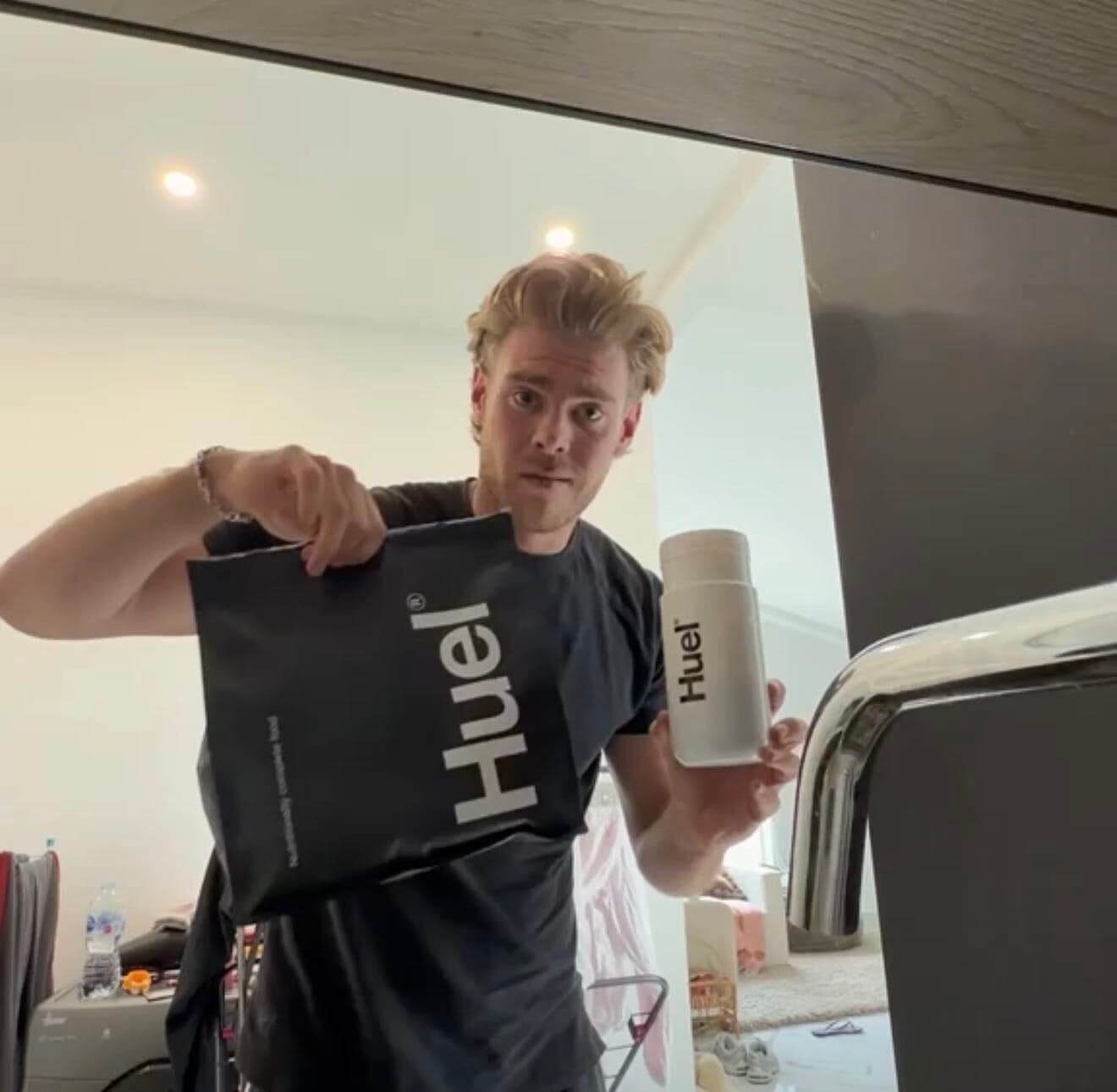 Sam McCarthy with Huel product